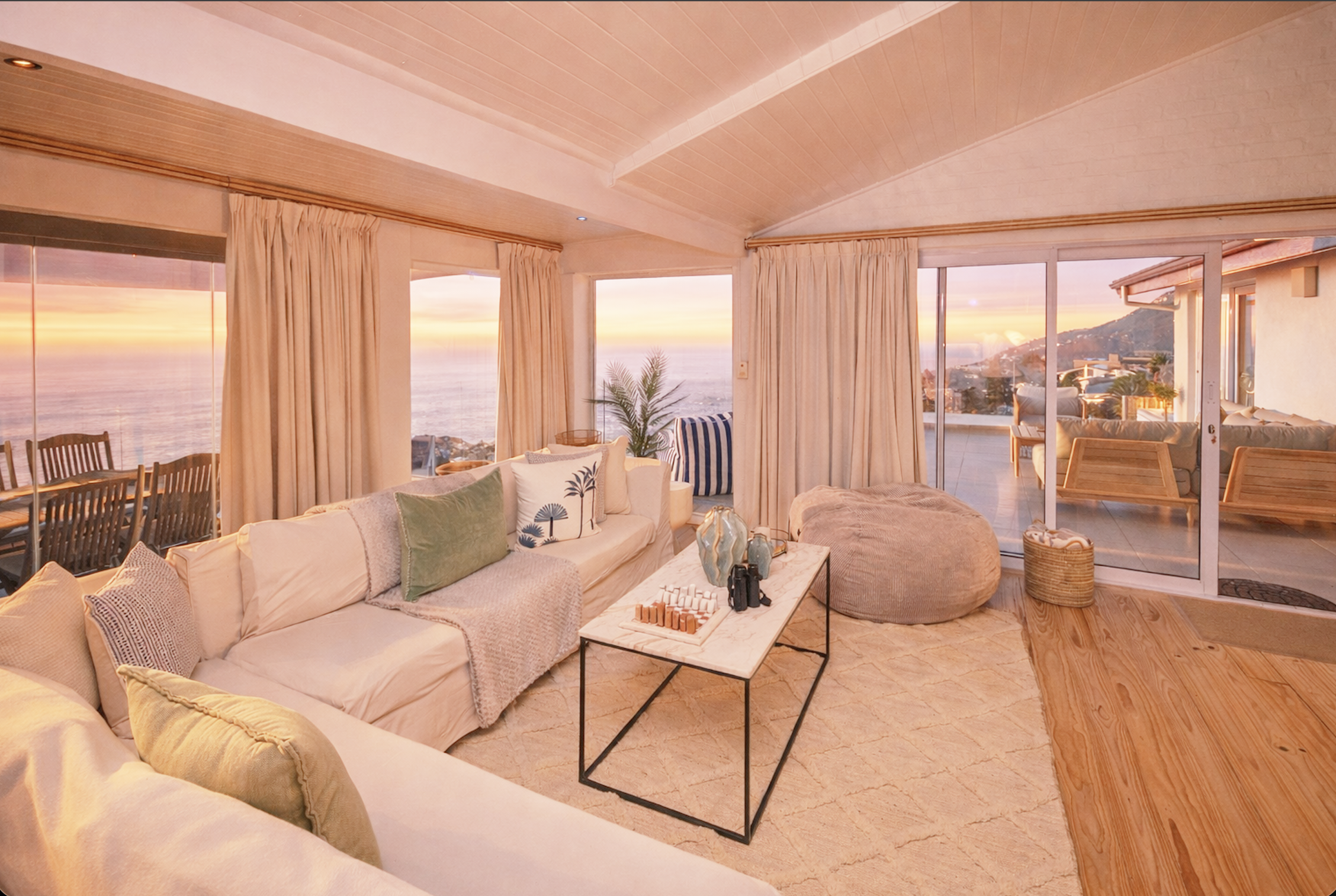 Living room with ocean sunset views